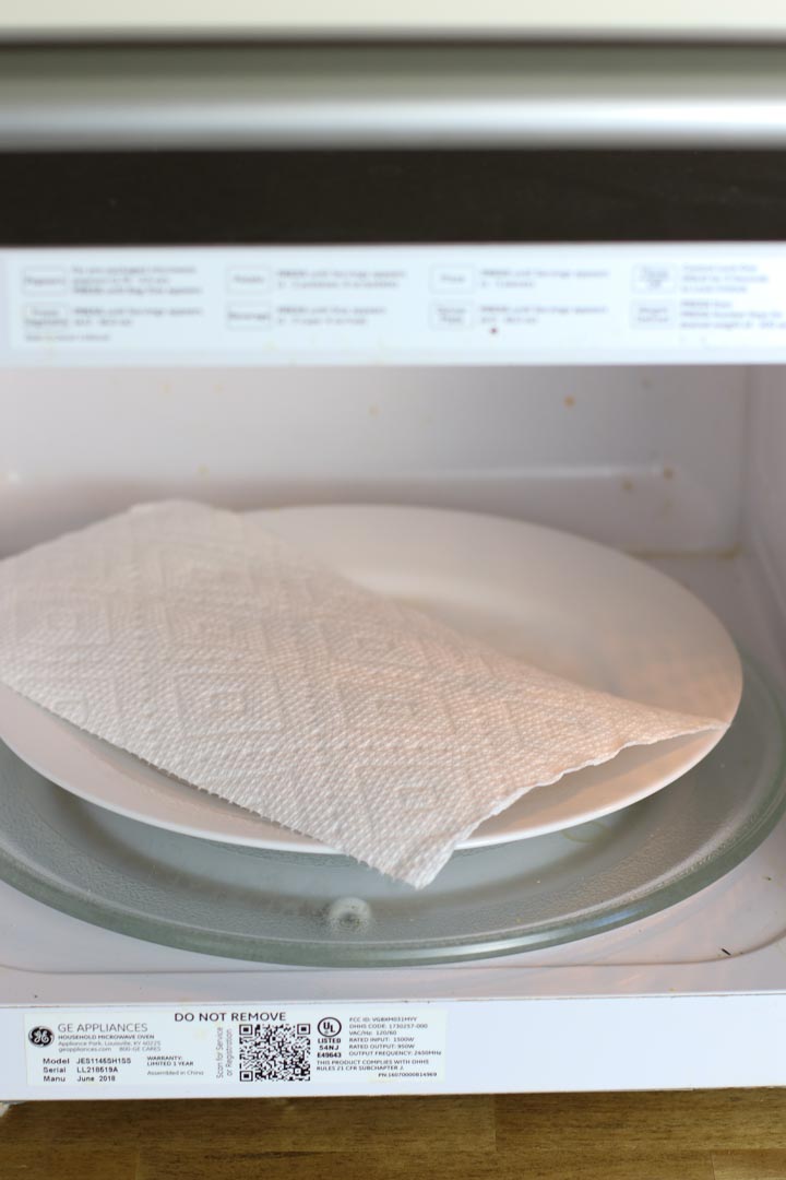 Paper towel covering steak umms in the microwave