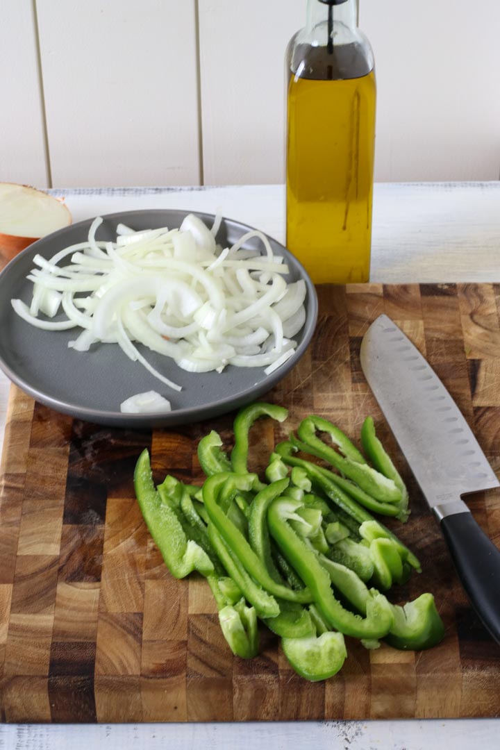 Sliced peppers and onions